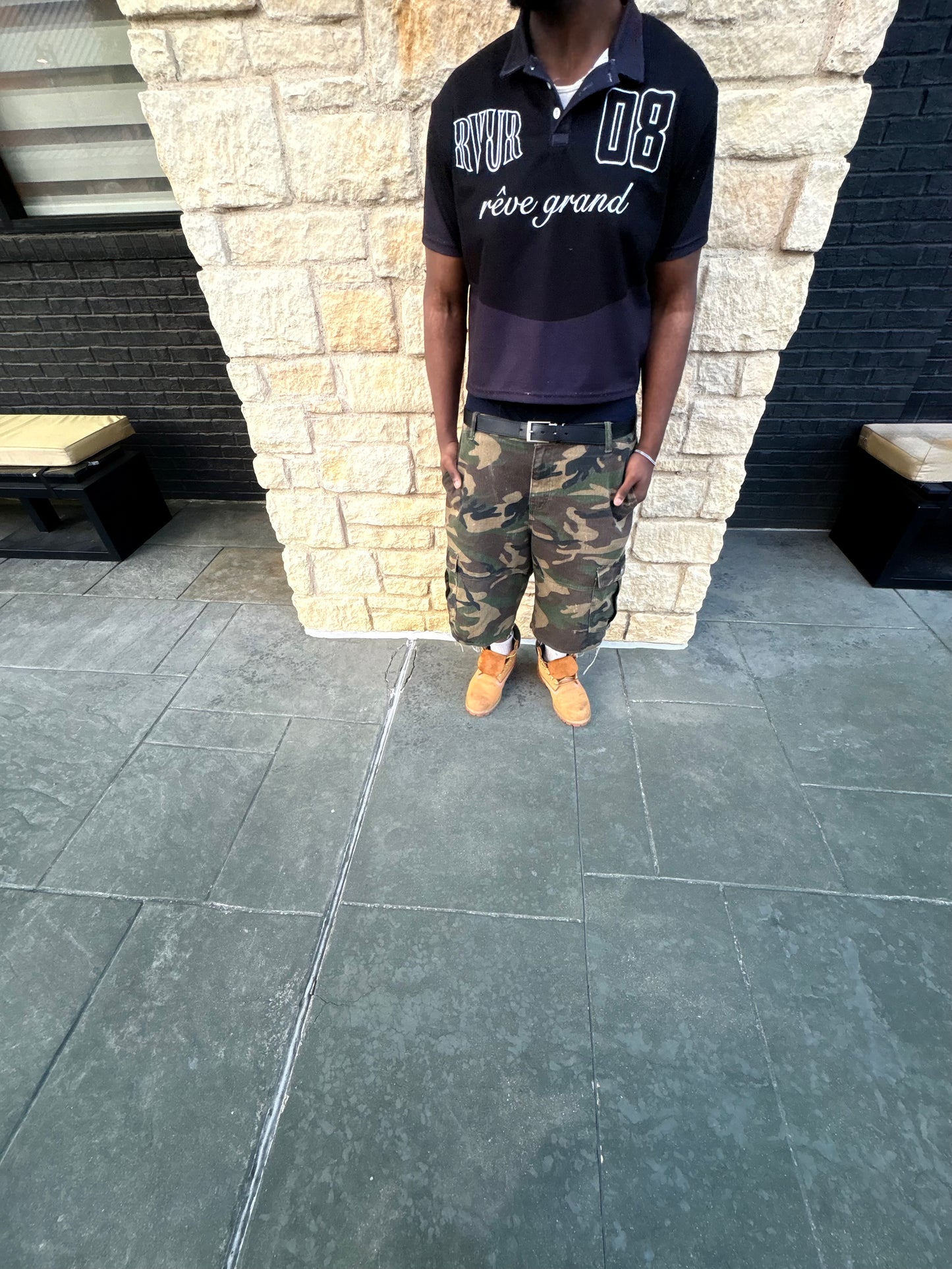 Black RVUR polo on model