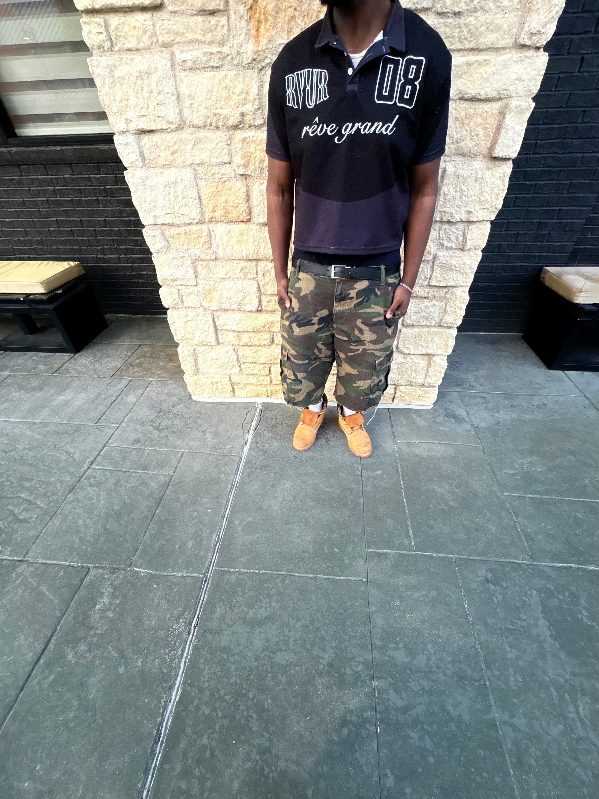Black RVUR polo on model